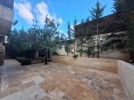 Ground floor apartment with garden for sale in Umm Al-Summaq 320m