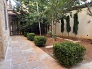 Ground floor apartment with garden for sale in Umm Al-Summaq 320m