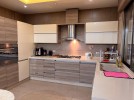 Ground floor apartment with garden for sale in Umm Al-Summaq 320m