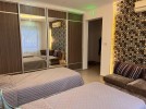 Ground floor apartment with garden for sale in Umm Al-Summaq 320m