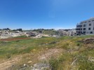 Land for sale with high view in Rujm Omaish, with a land area of 930m.
