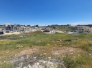 Land for sale suitable for building villas in Rujm Omaish, of 3300m