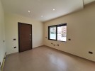 شقة ارضية مع ترس للبيع في دير غبار بمساحة بناء 155م