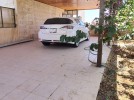 شقة ارضية مع حديقة للبيع في مرج الحمام بمساحة بناء 150م