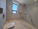 Attached villa with pool for sale in New Bader building area of 600m