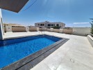 Attached villa with pool for sale in New Bader building area of 600m