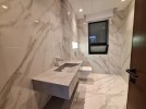 Attached villa with pool for sale in New Bader building area of 600m