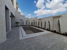 Semi attached villa with pool for sale in Dabouq built-up area 700m