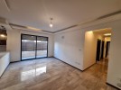 Ground floor apartments with a garden for sale in Khalda 204