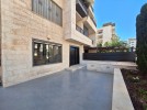 Ground floor apartments with a garden for sale in Khalda 204