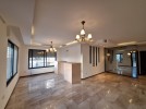 Ground floor apartments with a garden for sale in Khalda 204