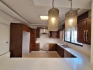 Ground floor apartments with a garden for sale in Khalda 204