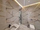 Ground floor apartment with pool for sale in Al Kursi 250m