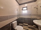 Ground floor with a private garage for sale in Al Kursi area of 191m