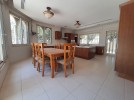 Villa with pool for sale in Al-Thuhair, with a land area of 1,490m