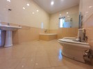 Villa with pool for sale in Al-Thuhair, with a land area of 1,490m