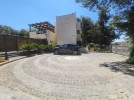 Villa with pool for sale on Umm Al Kundam, land area of 2,250m