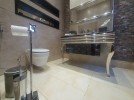 Villa with pool for sale on Umm Al Kundam, land area of 2,250m