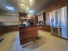 Villa with pool for sale on Umm Al Kundam, land area of 2,250m
