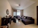 Flat apartment with a view within a compound for sale in Dair Ghbar 500m