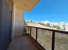 Flat apartment with a view within a compound for sale in Dair Ghbar 500m
