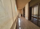 Flat apartment with a view within a compound for sale in Dair Ghbar 500m