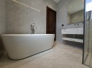 Duplex apartment with terrace for sale in Rujm Omaish, area of 390m