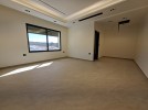 Duplex apartment with terrace for sale in Rujm Omaish, area of 390m