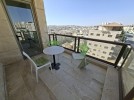 Second-floor for sale in Qaryet Al Nakheel, built-up area of 183m