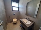 Attached villa for sale in Al Hummar with a land area of 550m