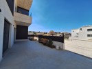 Attached villa for sale in Al Hummar with a land area of 550m