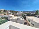 Attached villa for sale in Al Hummar with a land area of 550m
