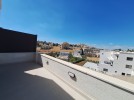 Attached villa for sale in Al Hummar with a land area of 550m