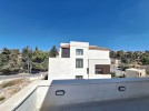 Attached villa for sale in Al Hummar with a land area of 550m