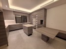 Attached villa for sale in Al Hummar with a land area of 550m