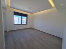 Attached villa for sale in Al Hummar with a land area of 550m