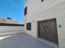 Attached villa for sale in Al Hummar with a land area of 550m