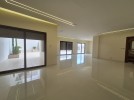 Apartment with a garden for sale in Al Hummar 207m