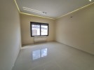 Apartment with a garden for sale in Al Hummar 207m