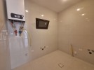 Apartment with a garden for sale in Al Hummar 207m
