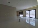 Apartment with a garden for sale in Al Hummar 207m