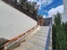 Apartment with a garden for sale in Al Hummar 207m