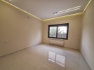 Apartment with a garden for sale in Al Hummar 207m