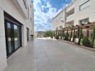 Apartment with a garden for sale in Al Hummar 207m