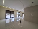 Apartment with a garden for sale in Al Hummar 207m