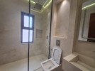 Apartment with a garden for sale in Al Hummar 207m