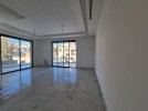 Ground floor apartment with a terrace for sale in Abdoun 300m