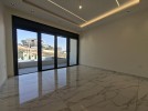 Ground floor apartment for sale in Al Hwaiti, with an area of 250m
