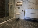 Ground floor apartment for sale in Al Hwaiti, with an area of 250m