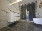 Duplex apartment with garden for sale in  Al Hwaiti, with an area 320m